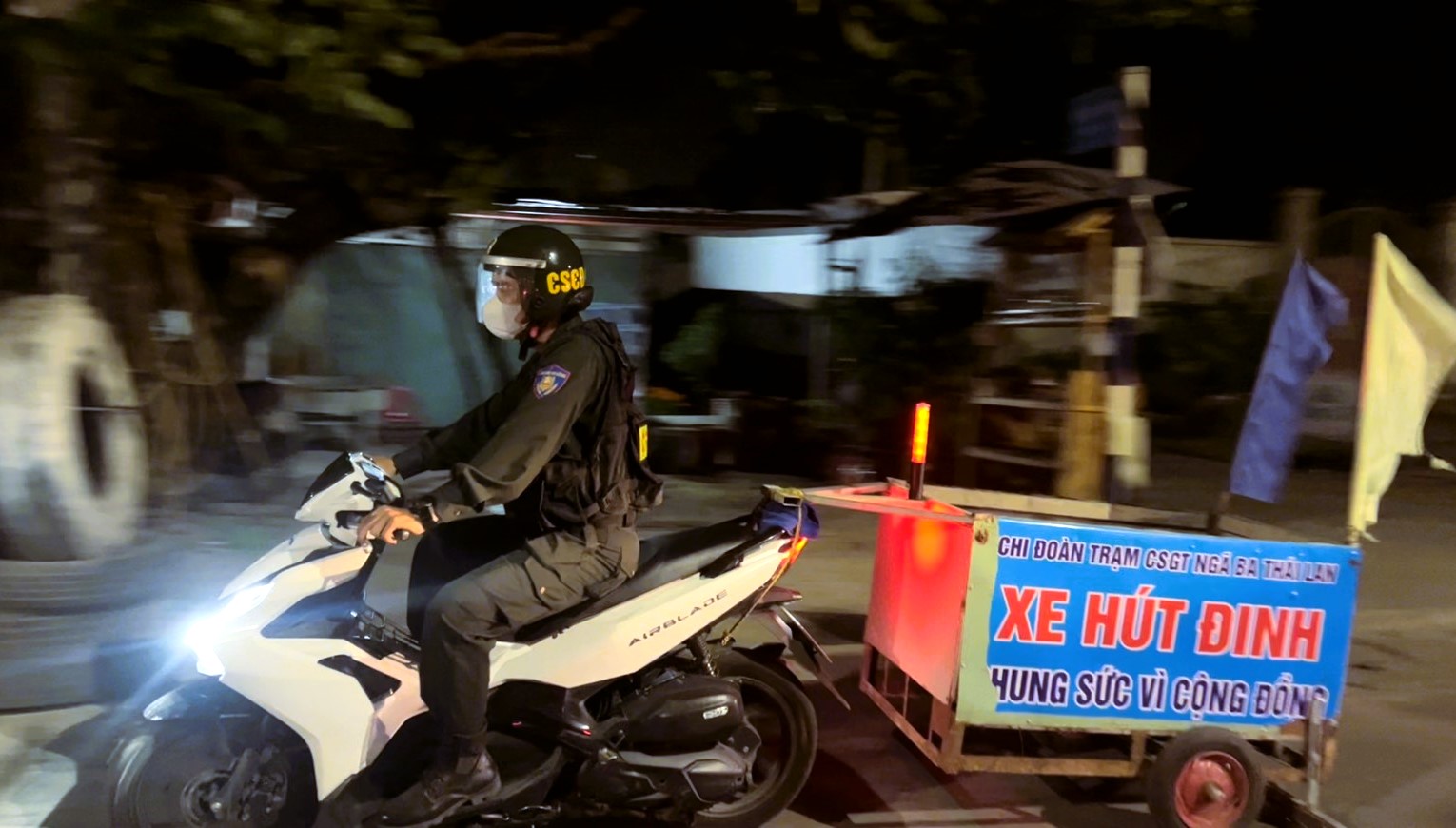 A person on a motorcycleDescription automatically generated